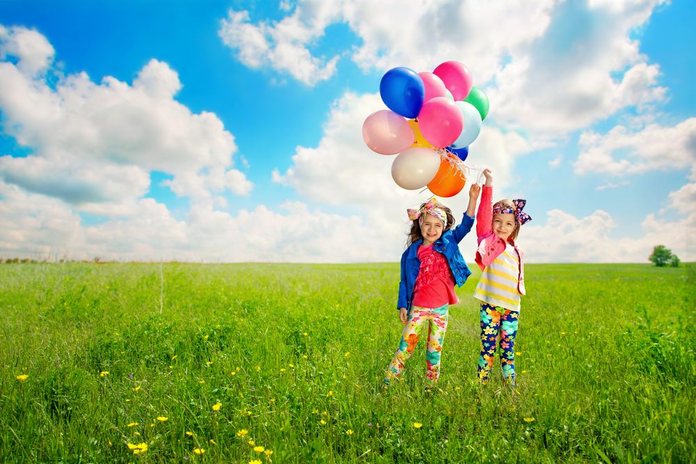 Child with balloons - Pediatric Dentistry in Lakewood, WA